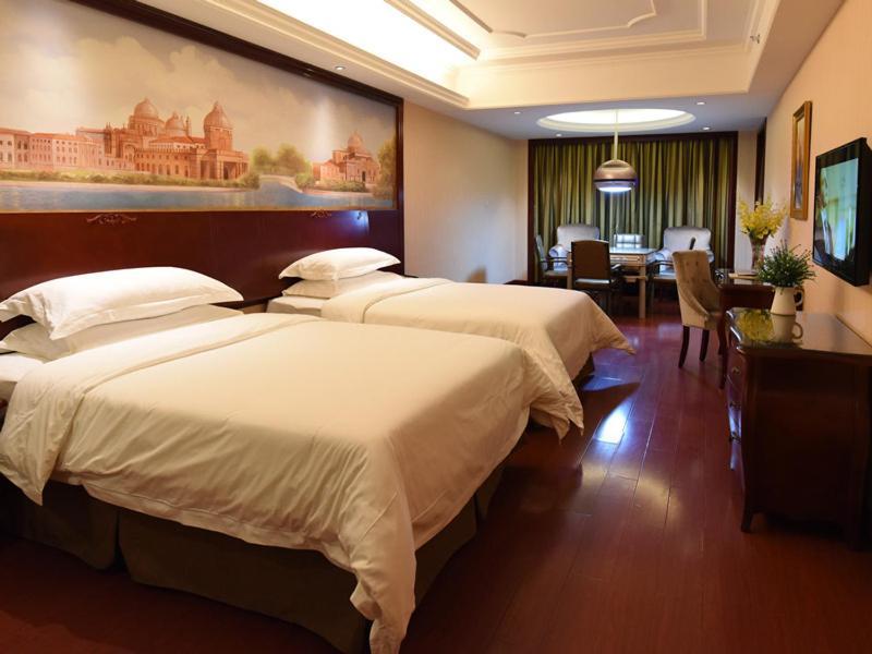 Vienna Hotel Loudi Chunyuan Pedestrian Street Bagian luar foto